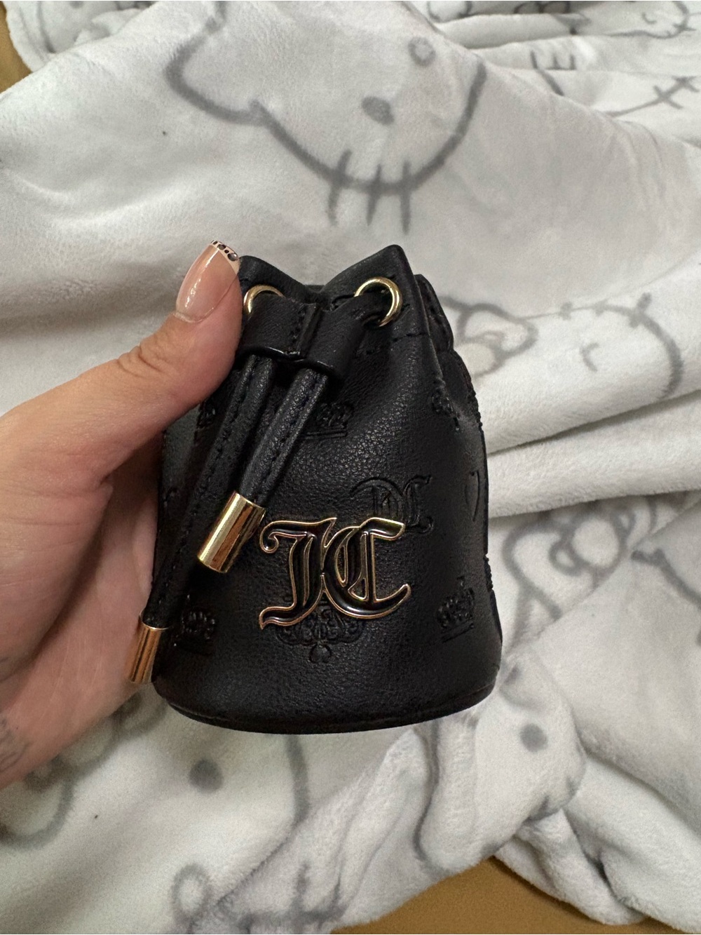 Black Mini Juicy Couture Drawstring Bucket Bag with Gold Hardware